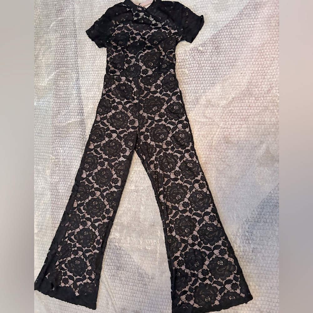 Black laced jumpsuit by: dStudio size:12